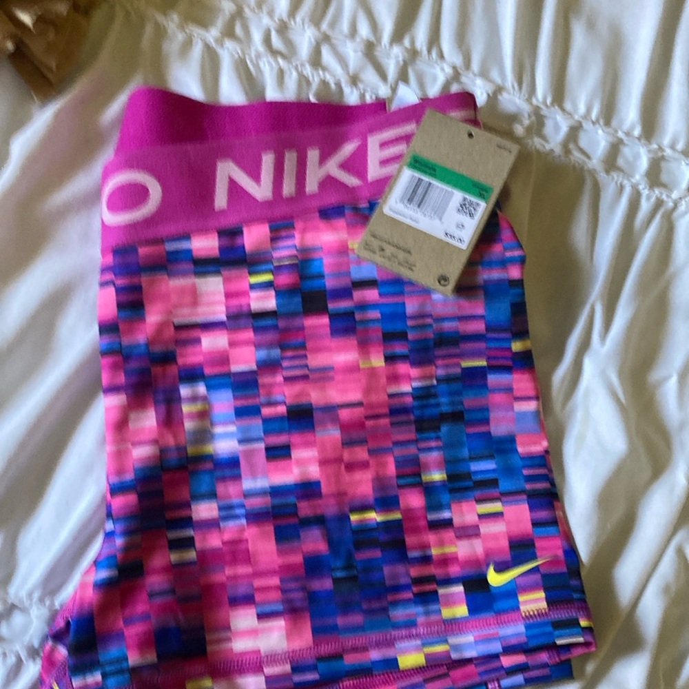 Nike shorts size XL multicolor pink. New with tags.